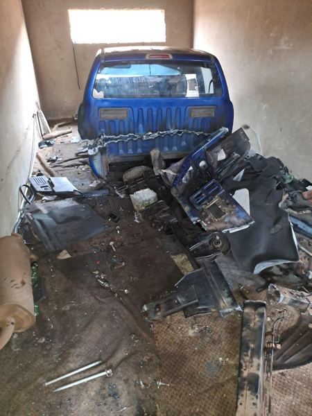 Stolen vehicle, stripped for parts — photo 43