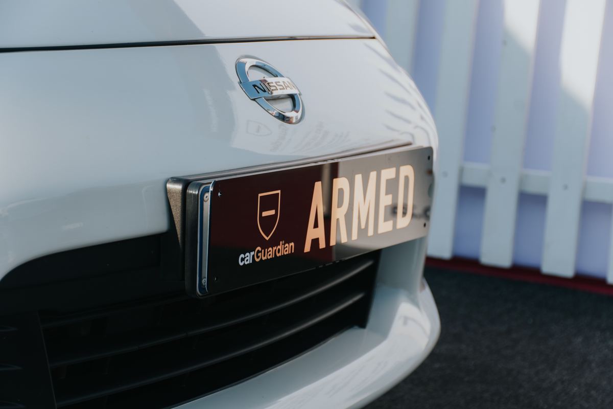 carGuardian ARMED number plate on the demo car at Idle Auto Expo
