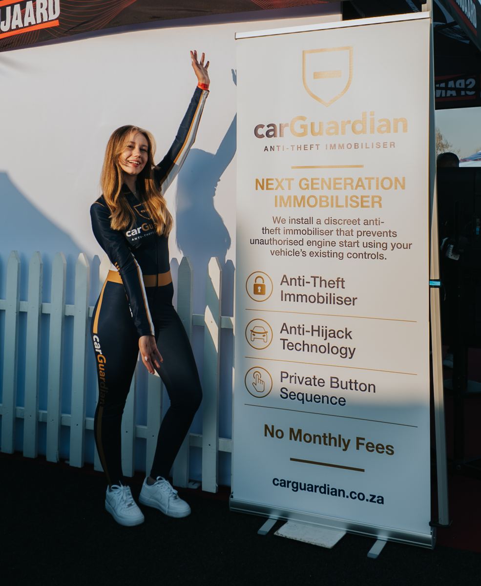 carGuardian banner with product features at the expo stand